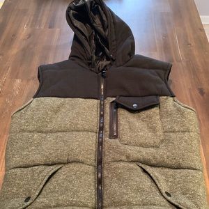 Green and black puffer vest